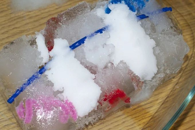 Block of ice covered with salt